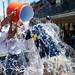 The Michigan softball team dumps water on head coach Carol Hutchins after the game against Northwestern on Sunday, May 5. Daniel Brenner I AnnArbor.com
